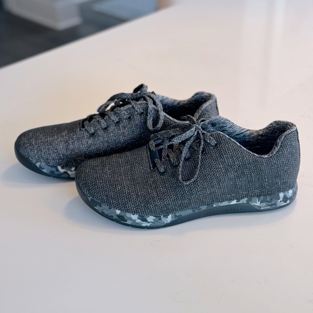 Black Nobull sneakers with camouflage sole
